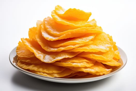 Crispy sweet fried tea pastry in a plate on a white background.