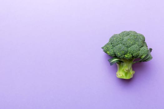 Broccoli scattered on white wooden table.copy space.Top view