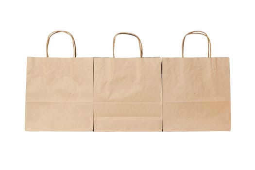 kraft paper ecologic bag on isolated white background.