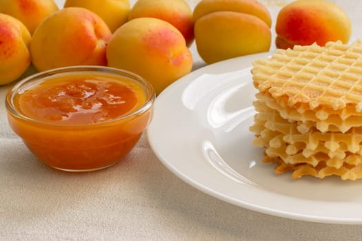 Homemade cookies with apricot jam on a plate