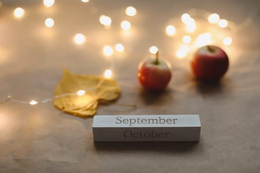 Hello September. Autumnal composition. Fall leaves, apples. Autumn, thanksgiving concept. Flat lay, top view