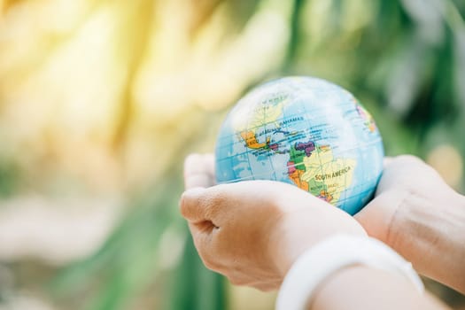 The Green Planet in Your Hands is a powerful symbol of Earth's salvation. This concept for Environment and Earth Day represents responsibility, wisdom, and global support for our environment.