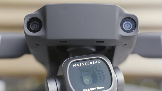 Close up of quadcopter with new generation of professional camera. Concept of prefeccional video and photo aerial shooting, camera of a drone.