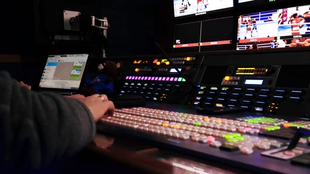 Control panel of TV Studio. Stock footage. Many different luminous buttons on TV equipment in recording Studio. Professional control panel for recording and editing TV show.