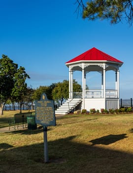 Grounds of park with bandstand in cityscape of Natchez in Mississippi