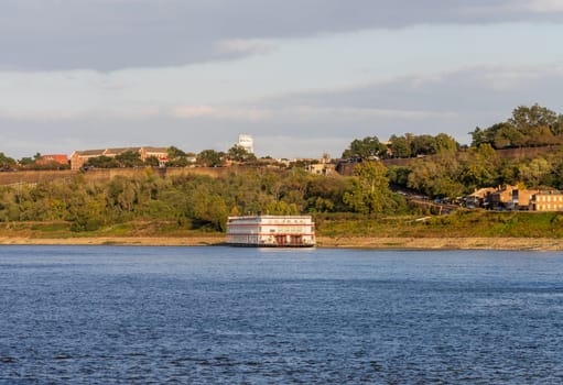 Traditional paddle steamer river cruise boat docked in low water to Natchez Mississippi