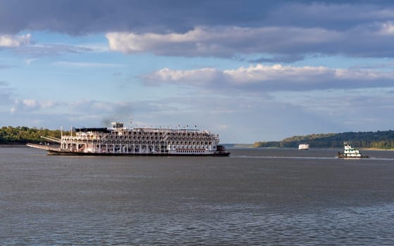 Natchez, MS - 26 October 2023: Paddle steamer river cruise boat American Queen departs in low water from Natchez Mississippi