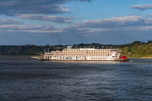 Natchez, MS - 26 October 2023: Paddle steamer river cruise boat American Queen departs in low water from Natchez Mississippi