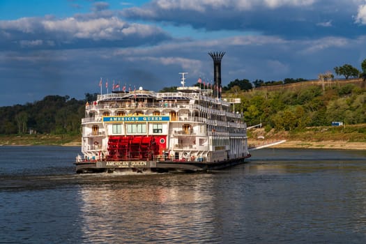 Natchez, MS - 26 October 2023: Paddle steamer river cruise boat American Queen departs in low water from Natchez Mississippi