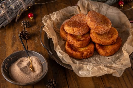 Traditional Portuguese Christmas Rabanadas. Spanish Torrijas on kitchen countertop.