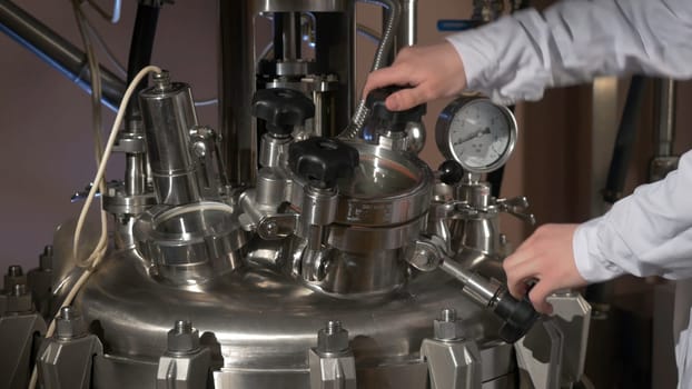 Medical specialist. Chemist opens the equipment