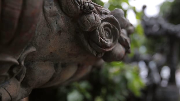 Garden statue vintage close-up. Sleeping Angel at La Recoleta Cemetery in Buenos Aires. Garden sculpture. Cupid sculpture. Sculpture of Angel at a Prague cemetery. Selective focus. Statue HD