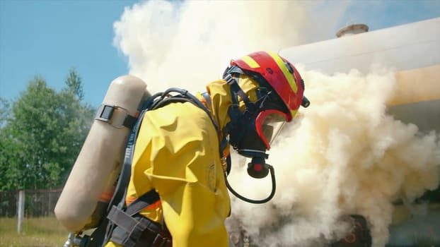 Preparation of firefighters for extinguishing. Clip. Firefighters are preparing equipment to extinguish fire. Preparation of extinguishing train car in summer.