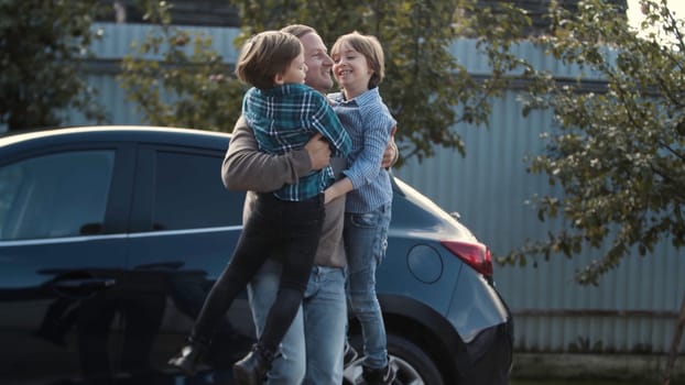 Children playing. Stock. Two little boys with long hair playing a red ball, throwing it to each other. High quality 4k footage