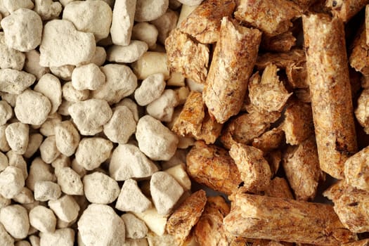 Different types of cat litter close up photo