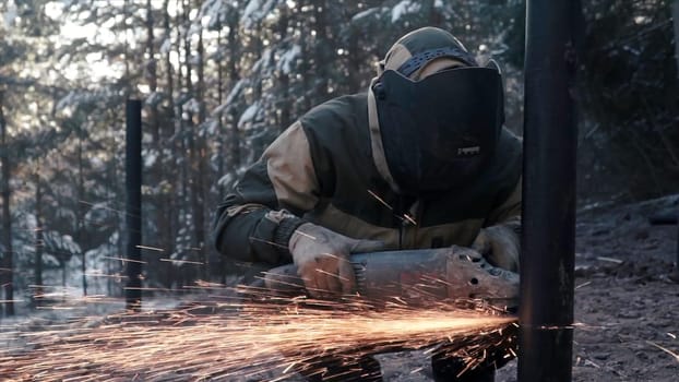 Metal sawing. Clip. Complex work with special equipment in the open. High quality FullHD footage