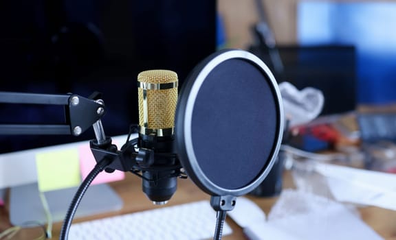 Studio microphone with screen in recording studio. Introduction of broadcasts and conferences concept