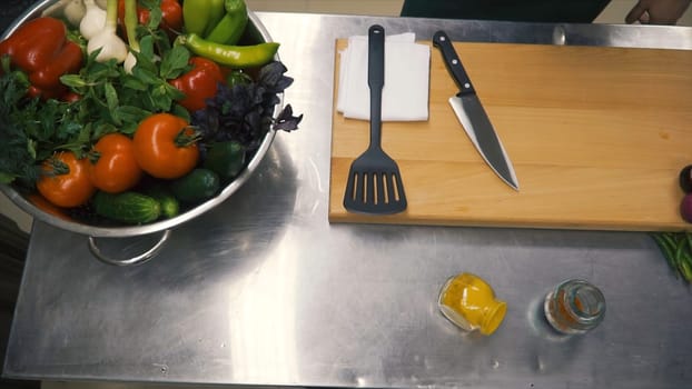 Fresh Raw Spring Vegetables. Clip. Food Vegetarian Background. Tomatoes, Cucumber, Radishes, Lettuce leaves in Metal Basket. Top view