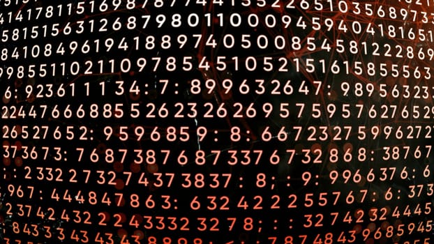 Programming on a black background with red illumination. Motion. Dark background in animation with appearing lines with numbers. High quality 4k footage