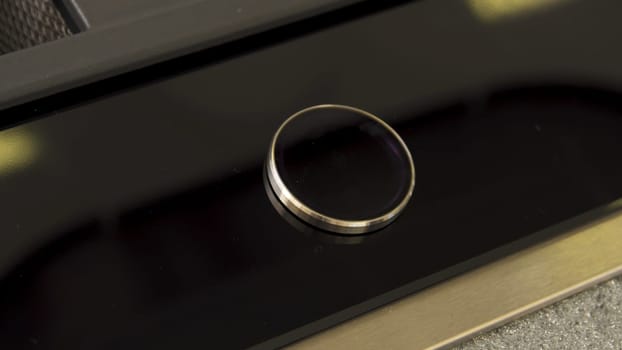 Close up of a modern induction stove control panel. Twist pad on a control sensor panel, modern technologies for the kitchen.