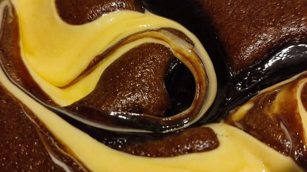 chocolate cake sponge cake with yellow cream, dessert sweets food. High quality photo