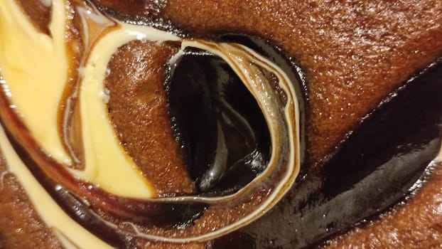 chocolate cake sponge cake with yellow cream, dessert sweets food. High quality photo