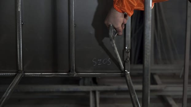 Blowing air on the metal parts before powder painting. Clip. Worker in protective equipment cleans the metal construction before painting them. Aluminum Air Duster Blower Gun Cleaning Clean Handy Tool.