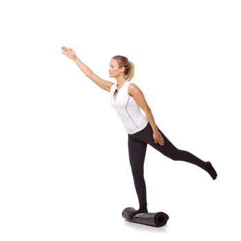 Woman, exercise and mat in studio for balance, pilates or workout for healthy body, wellness or fitness. Person, face and yoga in sportswear for physical activity on mock up space or white background.