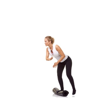 Woman, balance and mat in studio for fitness, pilates or workout for healthy body, wellness or exercise. Person, face and yoga in sportswear for physical activity on mock up space or white background.