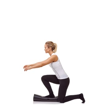 Woman, lunge and training on mat, studio profile or stretching for fitness, health or space by white background. Girl, yoga or pilates with exercise, thinking and muscle development for legs on floor.