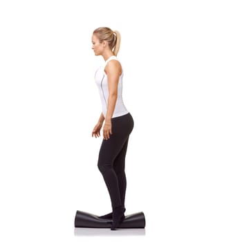 Woman, exercise and mat in studio for fitness, pilates or workout for healthy body, wellness or balance. Person, face and yoga in sportswear for physical activity on mock up space or white background.