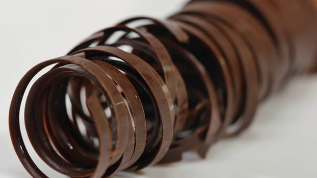 Sweet tubes - dessert. Chocolate tube for decoration, closeup