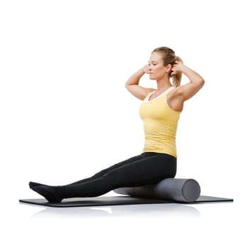 Studio workout, yoga foam roller and woman with posture fitness, spine rehabilitation or stretching exercise for recovery process. Floor, training and person sit on gym equipment on white background.