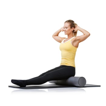 Studio workout, foam roller and pilates woman with posture training, core wellness challenge or stretching exercise for recovery. Ground, yoga mat and athlete physical activity on white background.