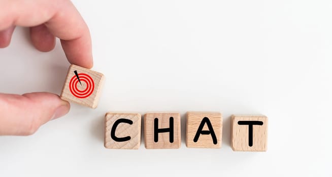 Word CHAT made with wood blocks on a light background. High quality photo