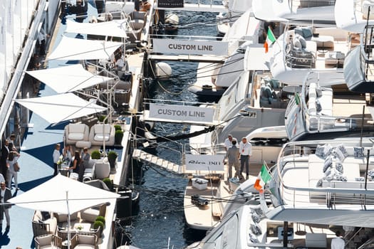 Monaco, Monte Carlo, 27 September 2022 - a lot of luxury yachts at the famous motorboat exhibition in the principality, the most expensive boats for the richest people around the world, yacht brokers. High quality photo