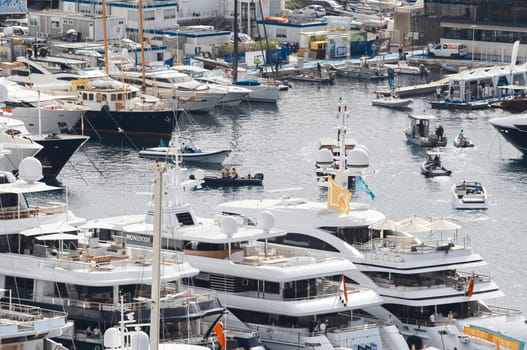 Monaco, Monte Carlo, 27 September 2022 - a lot of luxury yachts at the famous motorboat exhibition in the principality, the most expensive boats for the richest people around the world, yacht brokers. High quality photo