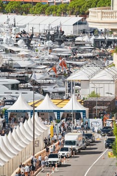 Monaco, Monte Carlo, 27 September 2022 - a lot of luxury yachts at the famous motorboat exhibition in the principality, the most expensive boats for the richest people around the world, yacht brokers. High quality photo