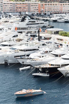 Monaco, Monte Carlo, 27 September 2022 - a lot of luxury yachts at the famous motorboat exhibition in the principality, the most expensive boats for the richest people around the world, yacht brokers. High quality photo