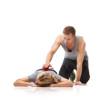 Massage ball, back and physiotherapist and woman with a woman with sport, fitness and workout back injury. Physical therapy, man and wellness with health and helping with white background and studio.