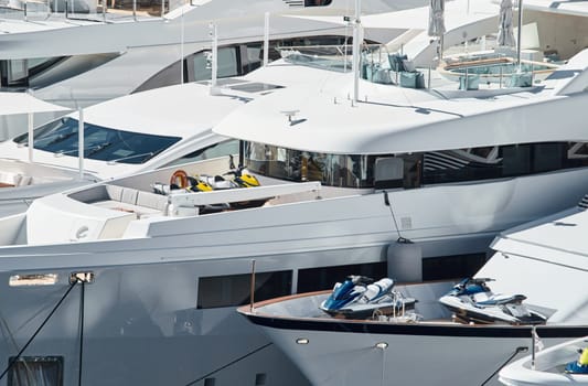 Few huge luxury yachts at the famous motorboat exhibition in the principality of Monaco, Monte Carlo, the most expensive boats for the richest people. High quality photo