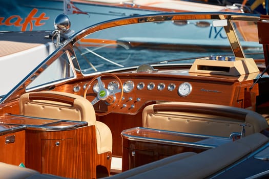 Monaco, Monte Carlo, 28 September 2022 - Interior of the luxury motor boat, port of Hercules in Monaco, sunny glare of the sun on the water, powerful boat, glossy surfaces shine in sunny weather. High quality photo