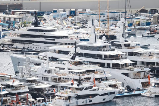 Monaco, Monte Carlo, 28 September 2022 - a lot of luxury yachts at the famous motorboat exhibition in the principality, the most expensive boats for the richest people around the world, yacht brokers. High quality photo