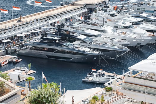 Monaco, Monte Carlo, 28 September 2022 - a lot of luxury yachts at the famous motorboat exhibition in the principality, the most expensive boats for the richest people around the world, yacht brokers. High quality photo