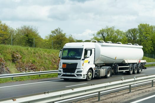 Transportation of liquid chemical products by road along the highway. Logistics concept.