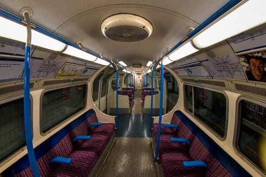 London, United Kingdom - April 01, 2007: Interior of empty Victoria line tube train. It connects Brixton and Walthamstow Central. Extreme wide angle (fisheye) photo