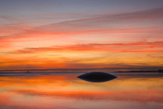 Fountain and pool near the Champalimaud foundation - Portuguese non-profit foundation for scientific medical research in Belem with sunset reflection