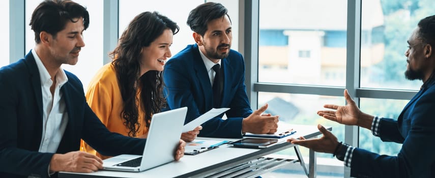 Diversity recruiters interview candidate at the bright office. A group of human resources professionals explaining an applicant for a new position. asking interviewee a question. Intellectual.