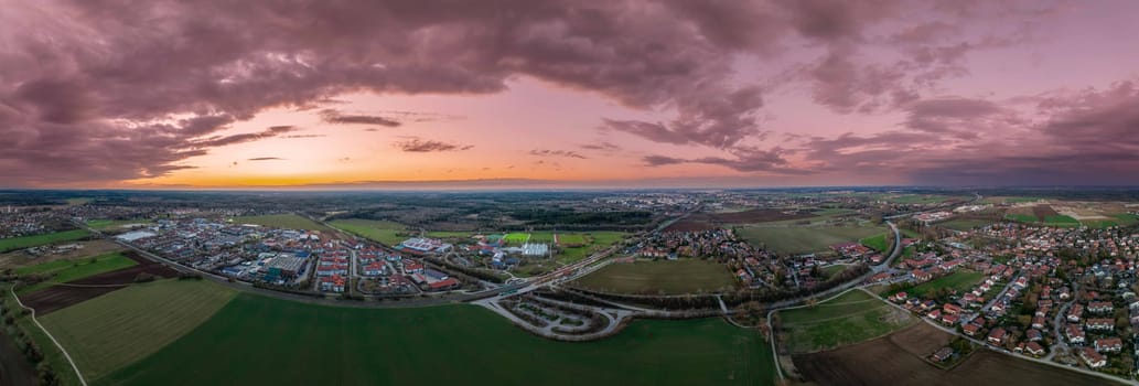 Sunset Over Countryside Town: Aerial View of Twilight.