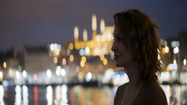 Young pretty woman photographer. Action.A professional camera in the hands of a master photographer who shoots in different places of the city in the evening and in the afternoon. High quality 4k footage